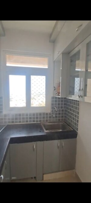Kitchen in 2 BHK Apartment at Nilaya Greens, Raj Nagar Extension – for Sale
