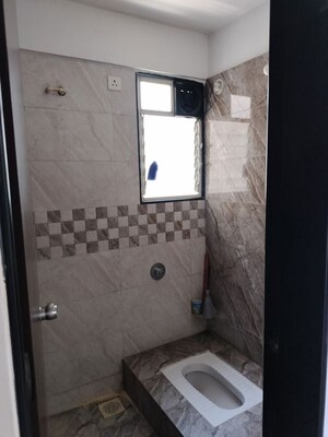 Bathroom in 2 BHK Apartment at Nirman Silver Mist, Lohgaon – for Rent