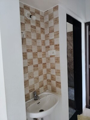 Bathroom in 2 BHK Apartment at Nirman Silver Mist, Lohgaon – for Rent