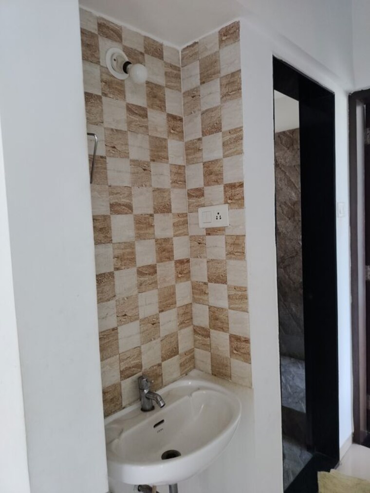 Bathroom, nirman-silver-mist 2 Bedroom 850 Sq.Ft. Apartment In Lohgaon Pune 10406891