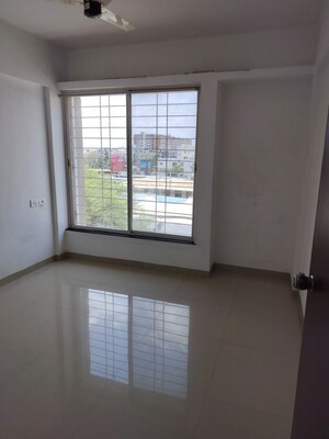 Room in 2 BHK Apartment at Nirman Silver Mist, Lohgaon – for Rent