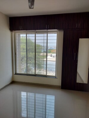Room in 2 BHK Apartment at Nirman Silver Mist, Lohgaon – for Rent