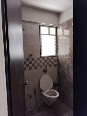 Bathroom in 2 BHK Apartment at Nirman Silver Mist, Lohgaon – for Rent