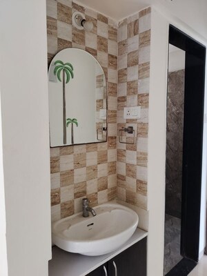 Bathroom in 2 BHK Apartment at Nirman Silver Mist, Lohgaon – for Rent