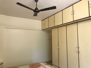 Room in 2 BHK Apartment at Atlas Skywalker CHS, Andheri West – for Sale