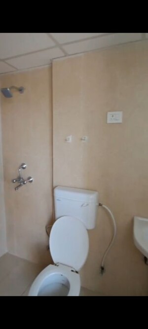 Bathroom in 2 BHK Apartment at Nilaya Greens, Raj Nagar Extension – for Sale