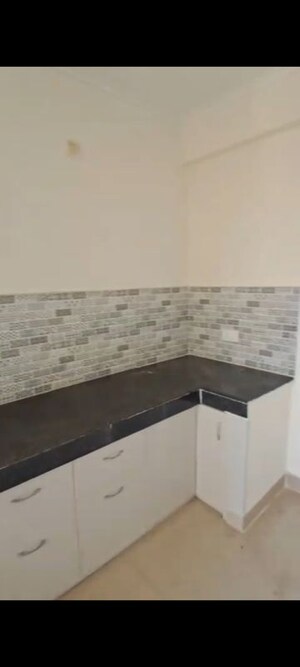 Kitchen in 2 BHK Apartment at Nilaya Greens, Raj Nagar Extension – for Sale