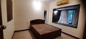 Bedroom in 2 BHK Apartment at Suryakiran CHS, Andheri West – for Rent