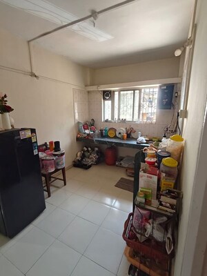 Living Room in 1 BHK Apartment at Indraprashta CHS, Dhanori – for Rent