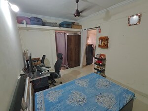Bedroom in 1 BHK Apartment at Indraprashta CHS, Dhanori – for Rent