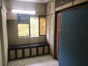 Bedroom in 1 BHK Apartment at Irla – for Rent