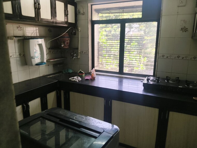 Kitchen, irla 1 Bedroom 400 Sq.Ft. Apartment In Irla Mumbai 10407042
