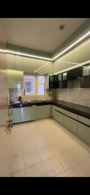 Kitchen in 4 BHK Apartment at Raj Nagar Extension – for Rent