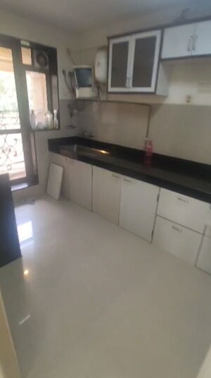 Kitchen in 2.5 BHK Apartment at Raheja Acropolis, Deonar – for Rent
