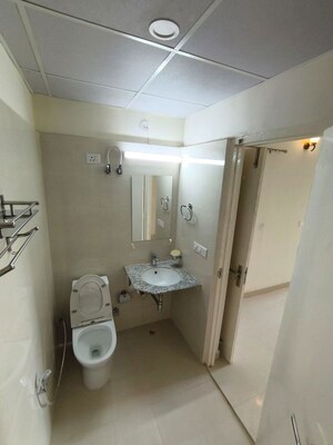 Bathroom in 2 BHK Apartment at Pardos Okas Residency, Sushant Golf City – for Rent