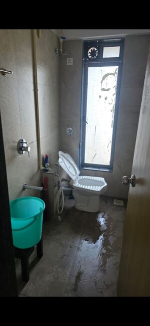Bathroom in 1 BHK Apartment at Nakul Raj , Malad West – for Rent