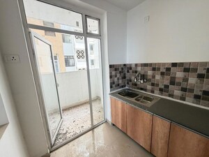 Kitchen in 1.5 BHK Apartment at Prateek Grand City, Siddharth Vihar – for Rent