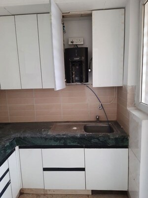 Kitchen in 4 BHK Apartment at Bptp Park Floors I, Sector 77 – for Rent