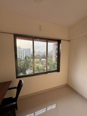 Room in 1 BHK Apartment at Parijat Paragon, Andheri West – for Sale