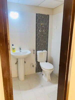 Bathroom in 2.5 BHK Apartment at Aims Golf City, Sector 75 – for Sale