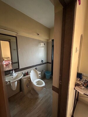 Bathroom in 2 BHK Apartment at K Raheja Heights, Malad East – for Rent