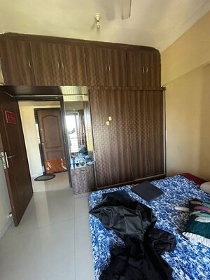 Bedroom in 2 BHK Apartment at K Raheja Heights, Malad East – for Rent