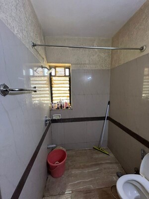 Bathroom in 2 BHK Apartment at K Raheja Heights, Malad East – for Rent