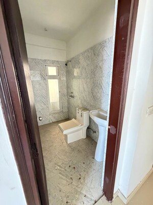Bathroom in 3 BHK Apartment at Prateek Grand City, Siddharth Vihar – for Rent