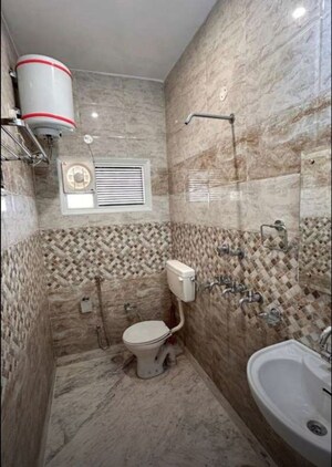 Bathroom in 4 BHK Builder Floor at Sector 37 – for Rent