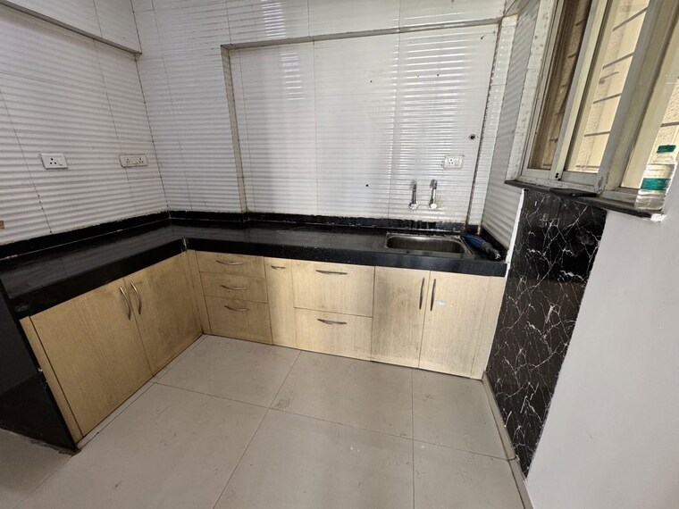 Kitchen, sukhwani-sepia-phase-2 2 Bedroom 980 Sq.Ft. Apartment In Tathawade Pune 10407406