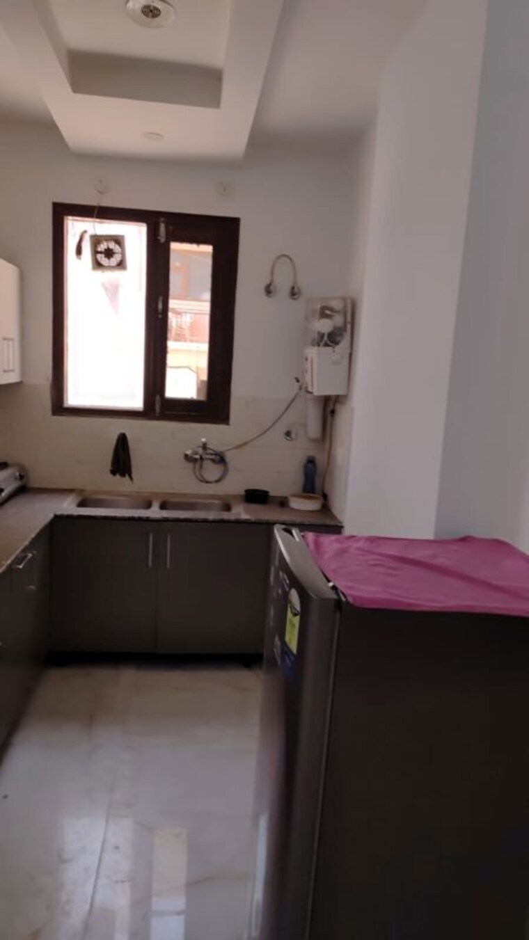 Kitchen, sunshine-enclave 2 Bedroom 1500 Sq.Ft. Apartment In Vip Road Zirakpur 10407418