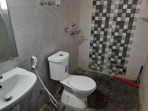 Bathroom in 3 BHK Apartment at Saya Gold Avenue, Vaibhav Khand – for Rent