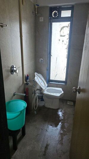 Bathroom in 1 BHK Apartment at Nakul Raj , Malad West – for Rent
