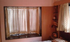 Living Room in 2 BHK Apartment at Cbd Belapur Sector 11 – for Sale