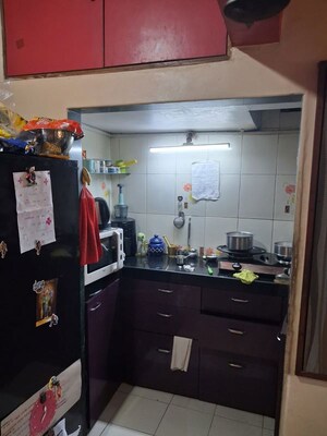 Kitchen in 2 BHK Apartment at Group Satellite Elegance, Goregaon East – for Rent