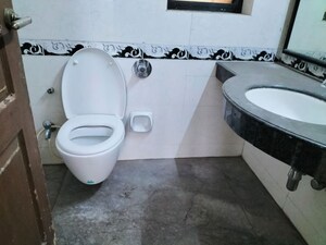 Bathroom in 2 BHK Apartment at Omkar Alta Monte, Malad East – for Rent