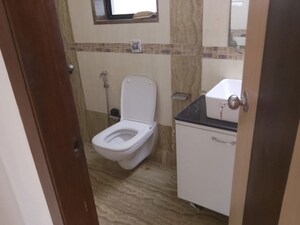 Bathroom in 2 BHK Apartment at Yashodeep Castle CHS, Oshiwara – for Rent