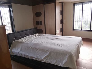 Bedroom in 2 BHK Apartment at Yashodeep Castle CHS, Oshiwara – for Rent