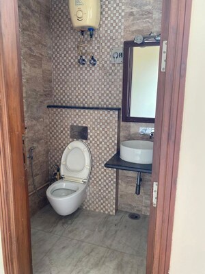 Bathroom in 3 BHK Builder Floor at New Friends Colony – for Rent