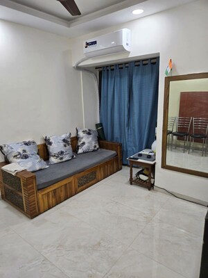 Living Room in 1 BHK Apartment at Rohan Takshila, Andheri East – for Rent