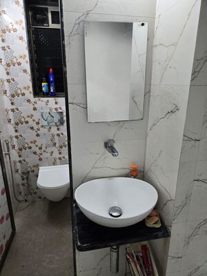 Bathroom in 1 BHK Apartment at Rohan Takshila, Andheri East – for Rent