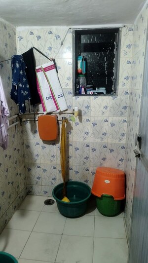 Bathroom in 1 BHK Apartment at Jai Om Gurumauli CHS, Dombivli West – for Rent
