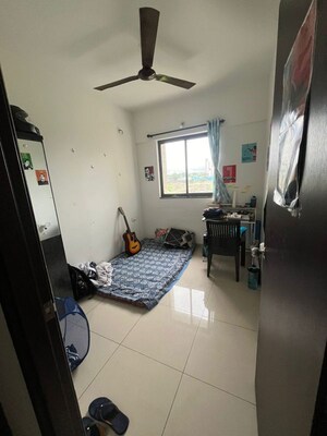 Bedroom in 2 BHK Apartment at Shapoorji Pallonji Joyville Hinjewadi, Hinjewadi – for Rent