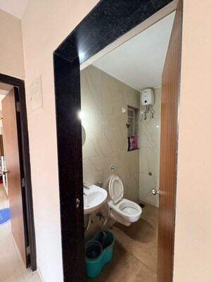 Bathroom in 1 BHK Apartment at Puranik Hometown, Ghodbunder Road – for Rent