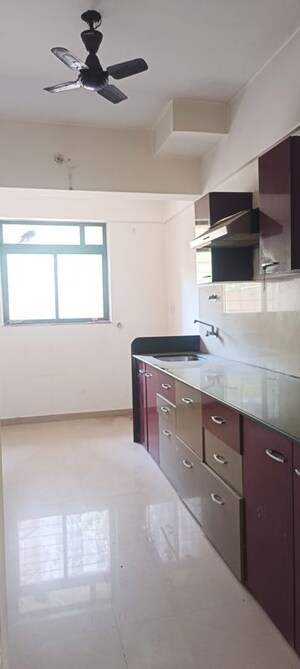 Kitchen in 1 BHK Apartment at Puranik Rumah Bali, Ghodbunder Road – for Rent