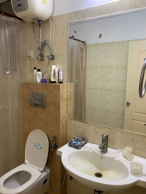 Bathroom in 3 BHK Apartment at Gulshan Vivante, Sector 137 – for Rent