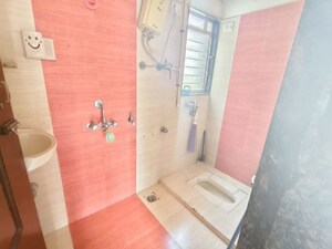 Bathroom in 2 BHK Apartment at Sanghvi Hills, Ghodbunder Road – for Rent