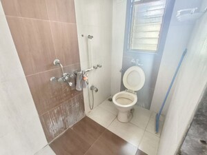 Bathroom in 2 BHK Apartment at Sanghvi Hills, Ghodbunder Road – for Rent