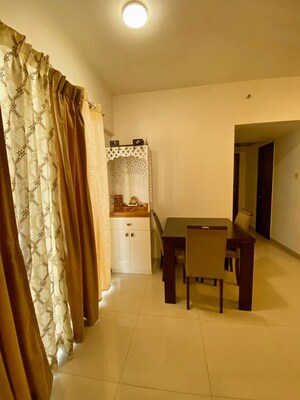 Living Room in 2 BHK Apartment at The Chatterjee The Crown Greens, Hinjewadi – for Rent