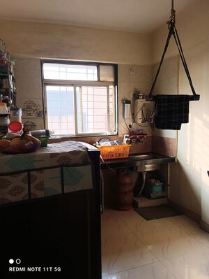 Living Room in 1 BHK Apartment at Vardhman Dhruv, Thergaon – for Sale